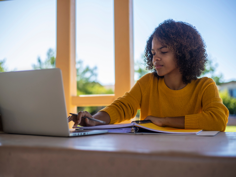 Student using laptop computer